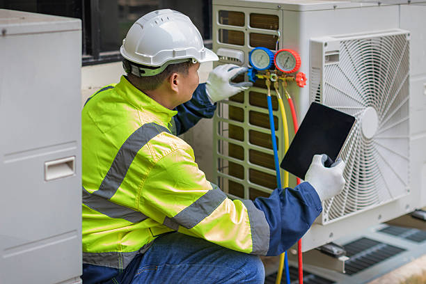 Professional Air Conditioning Repair technician working in Lake City, IA